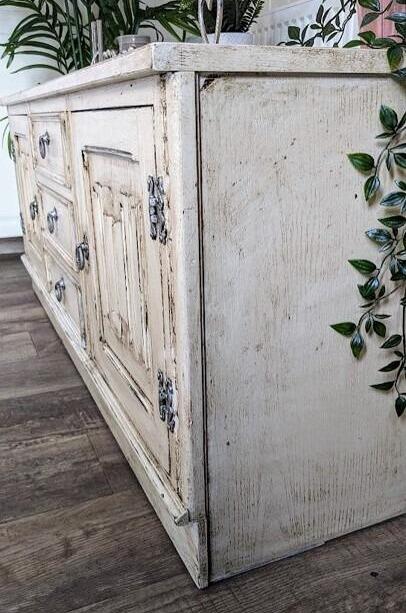 A side profile of this shabby chic low sideboard