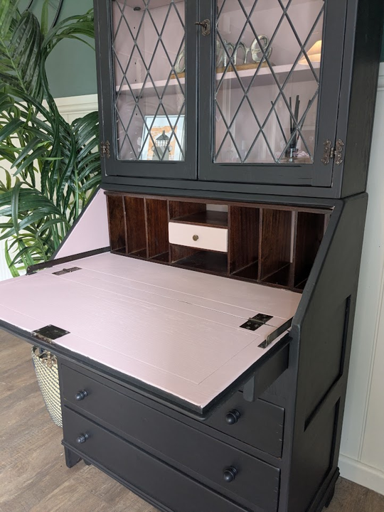 pink and black bureau bookcase