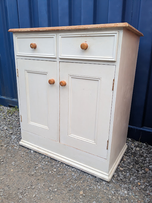 white cupboard with drawers