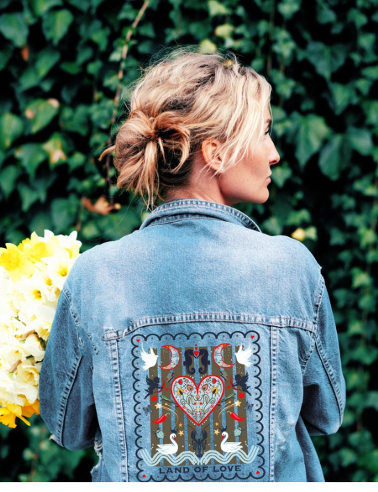 Woman wearing Land of Love Denim Jacket