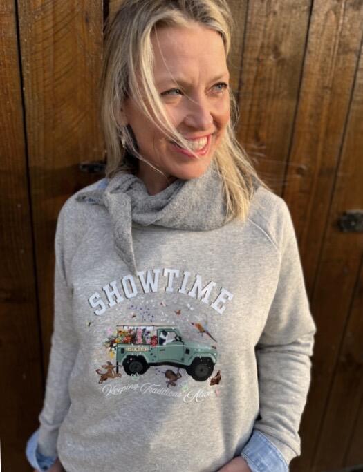 Woman wearing grey Showtime Sweat and light grey neck scarf