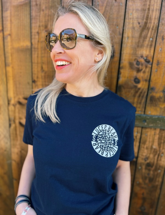 Woman wearing navy Power T-shirt