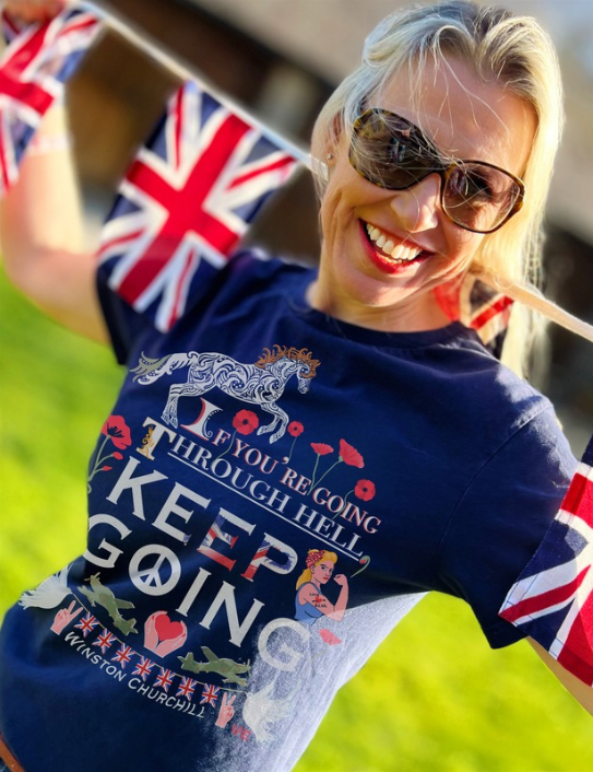 Woman wearing navy VE Day 80th Anniversary T-shirt