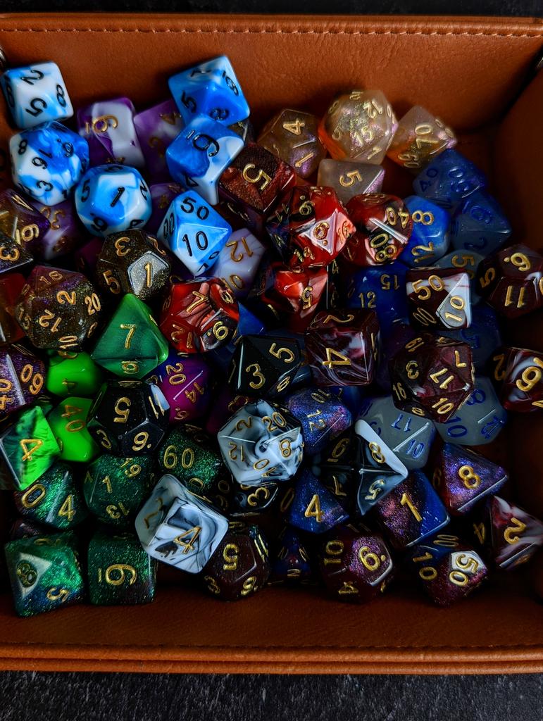 Want two free sets of Mystery Dice??