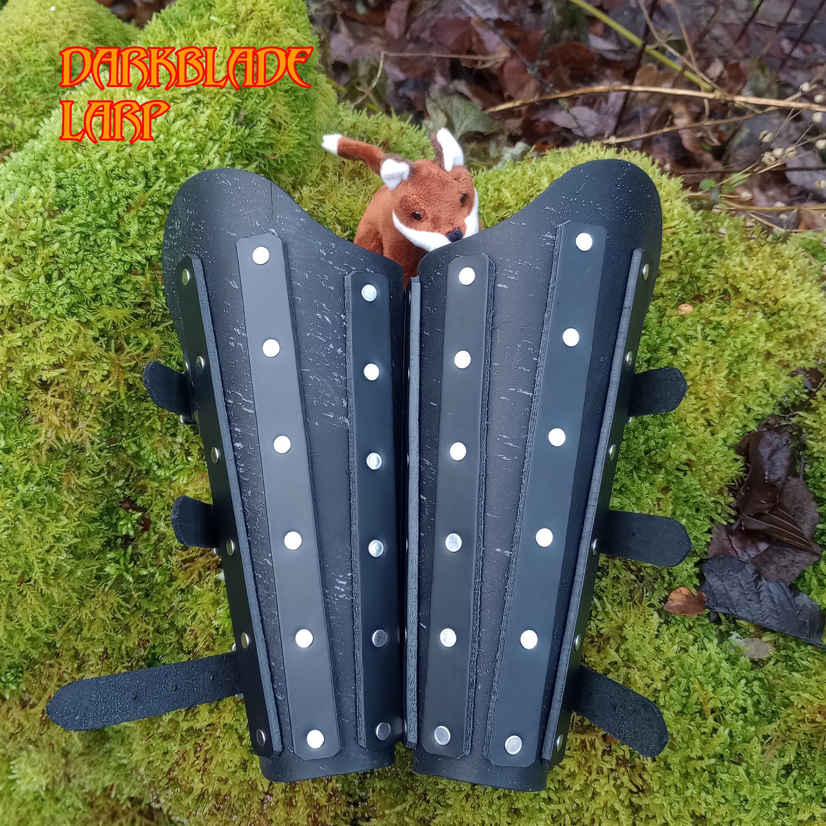 leather vambraces with leather splints running the length