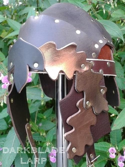 leather helmet decorated with leather leaves