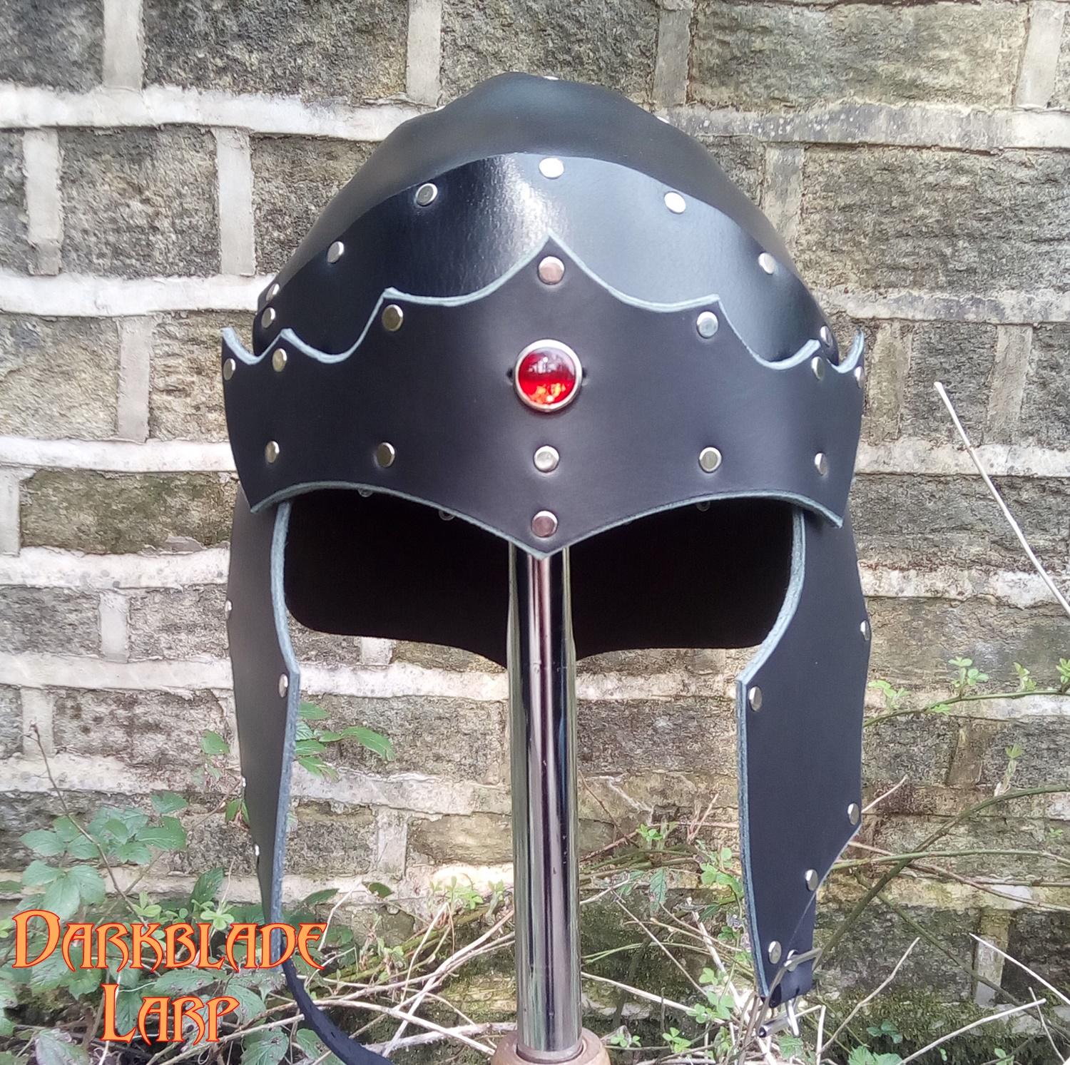 An open face leather helmet. The cheek pieces look like stylised wings