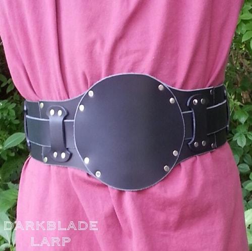 A wide belt with a thinner belt over the top