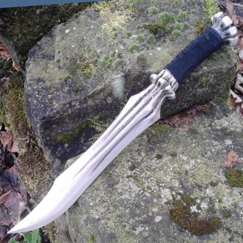 A large knife that looks like it's made out of bone