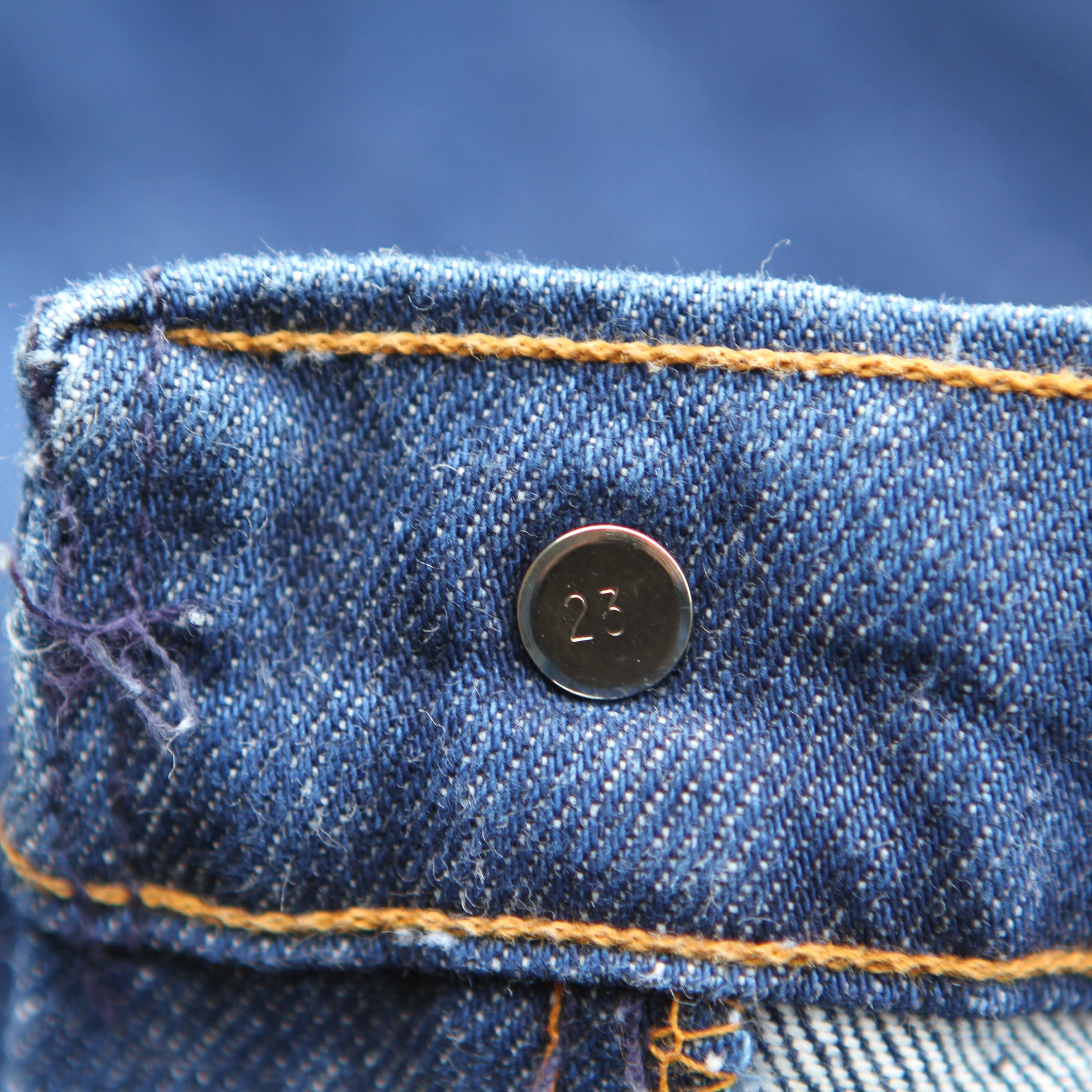 Classic Levi dark blue denim jeans- rivet number