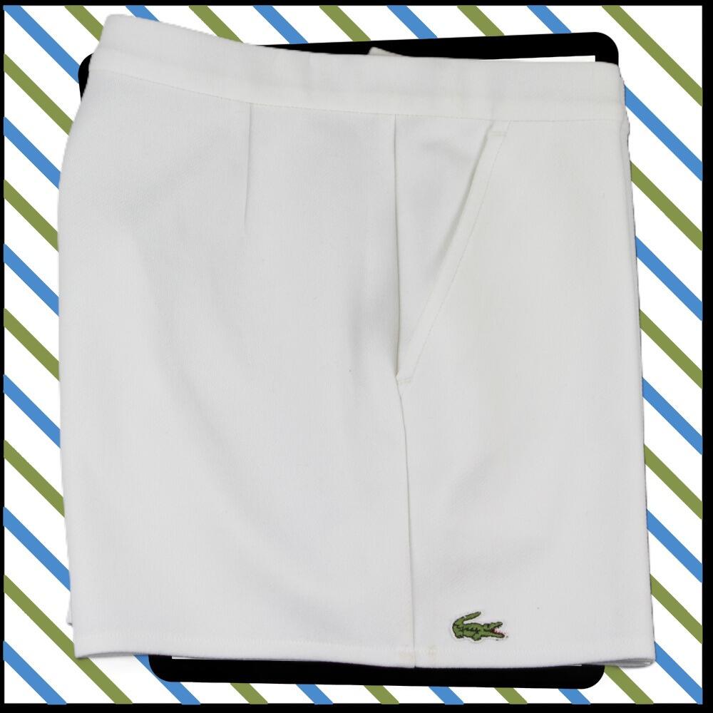 Vintage Lacoste tennis shorts, in white- side view