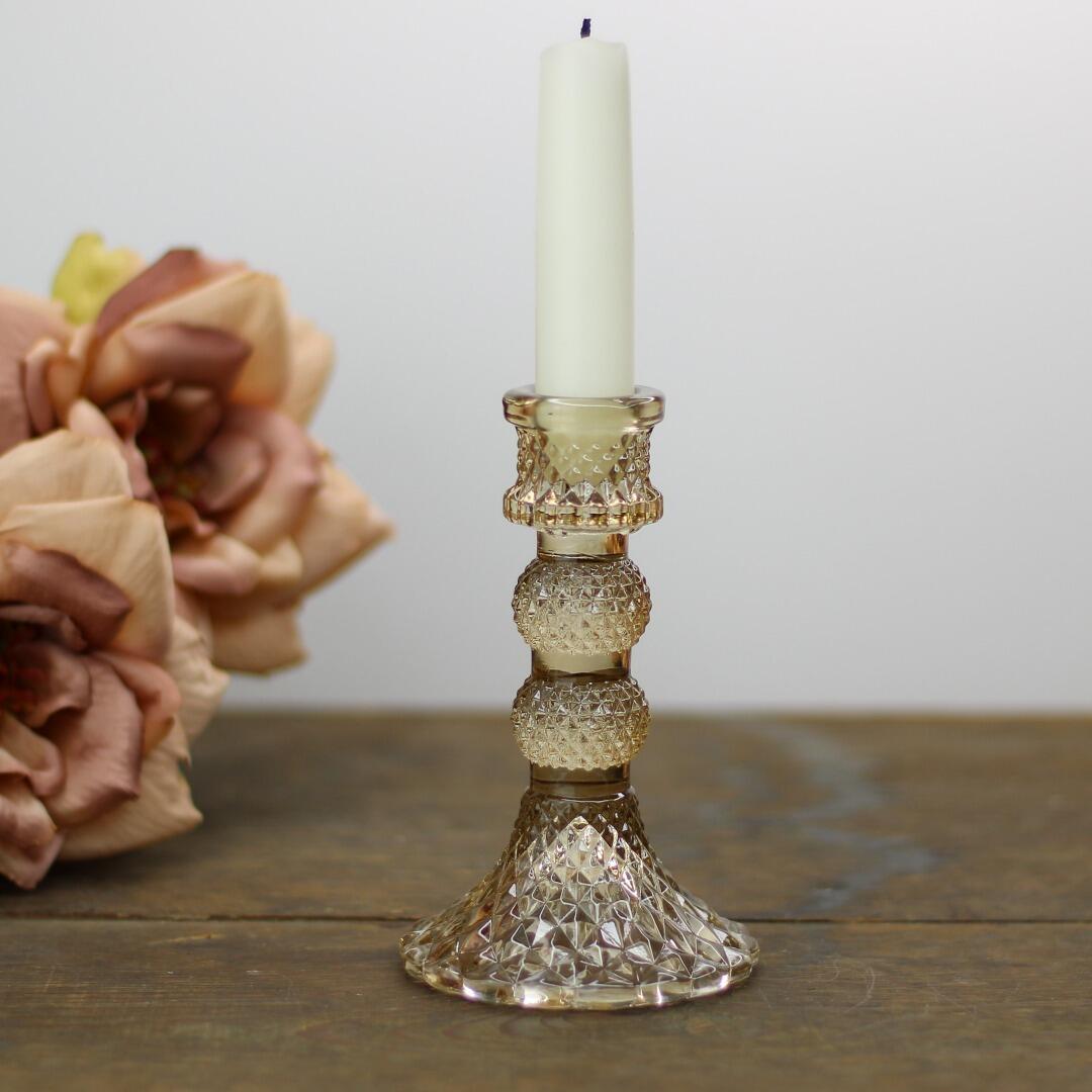 small coloured glass candle stick