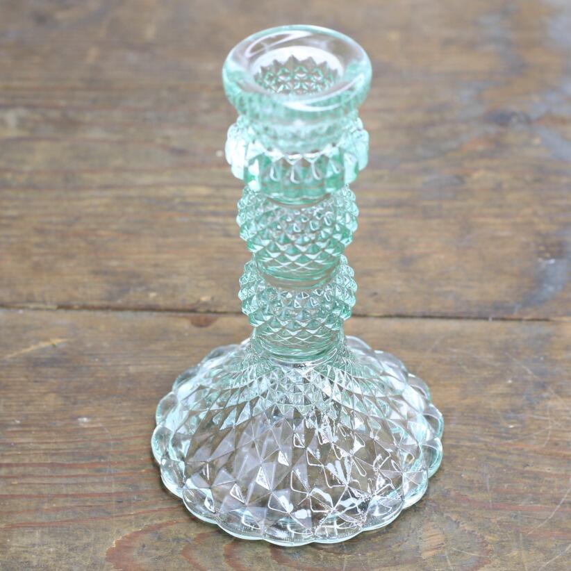 green glass harlequin candle holder