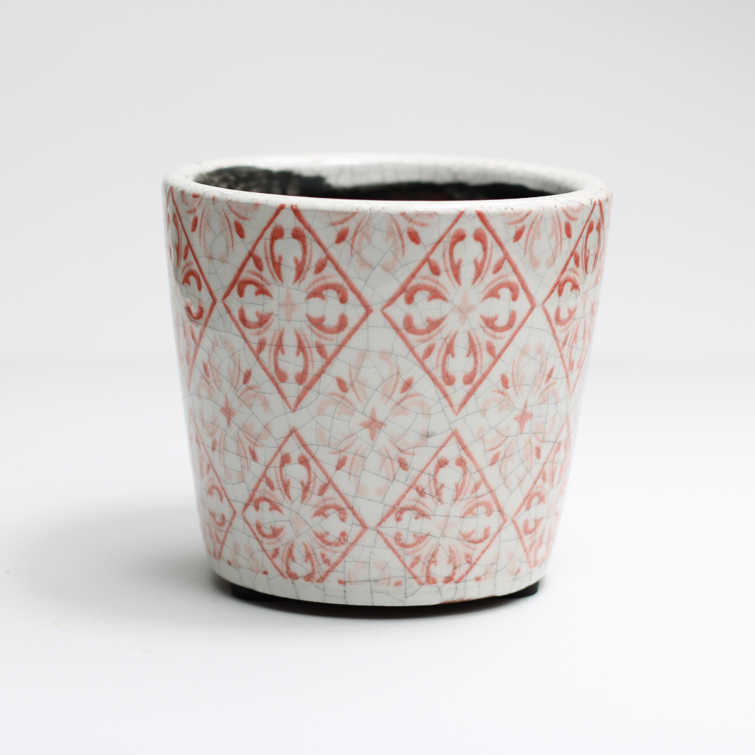 tiny terracotta pot with an antique style design