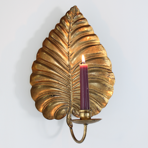 Wall sconce candle with vintage gold finish.
