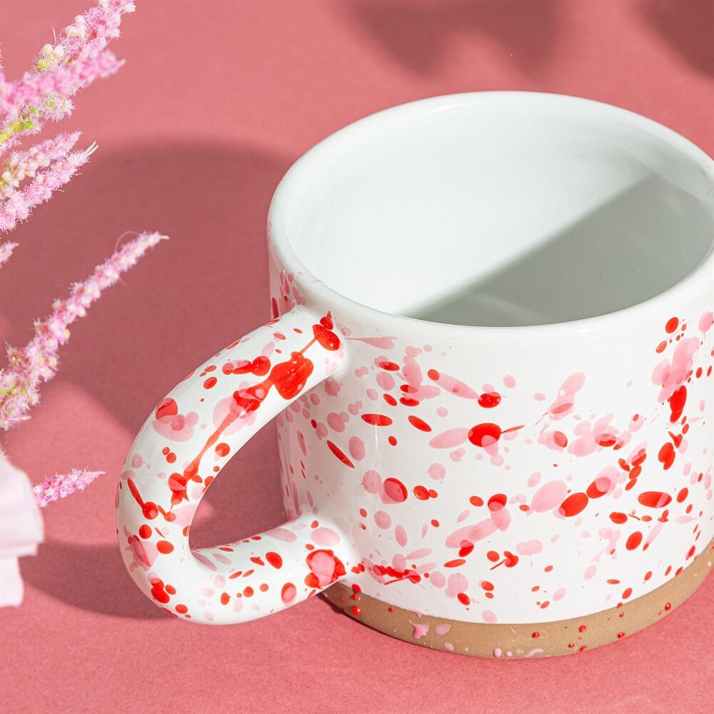 Pink and Red splatter mug lifestyle picture