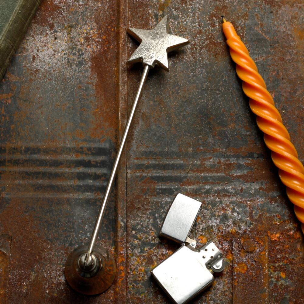 Long handled candle snuffer with antique style star top design