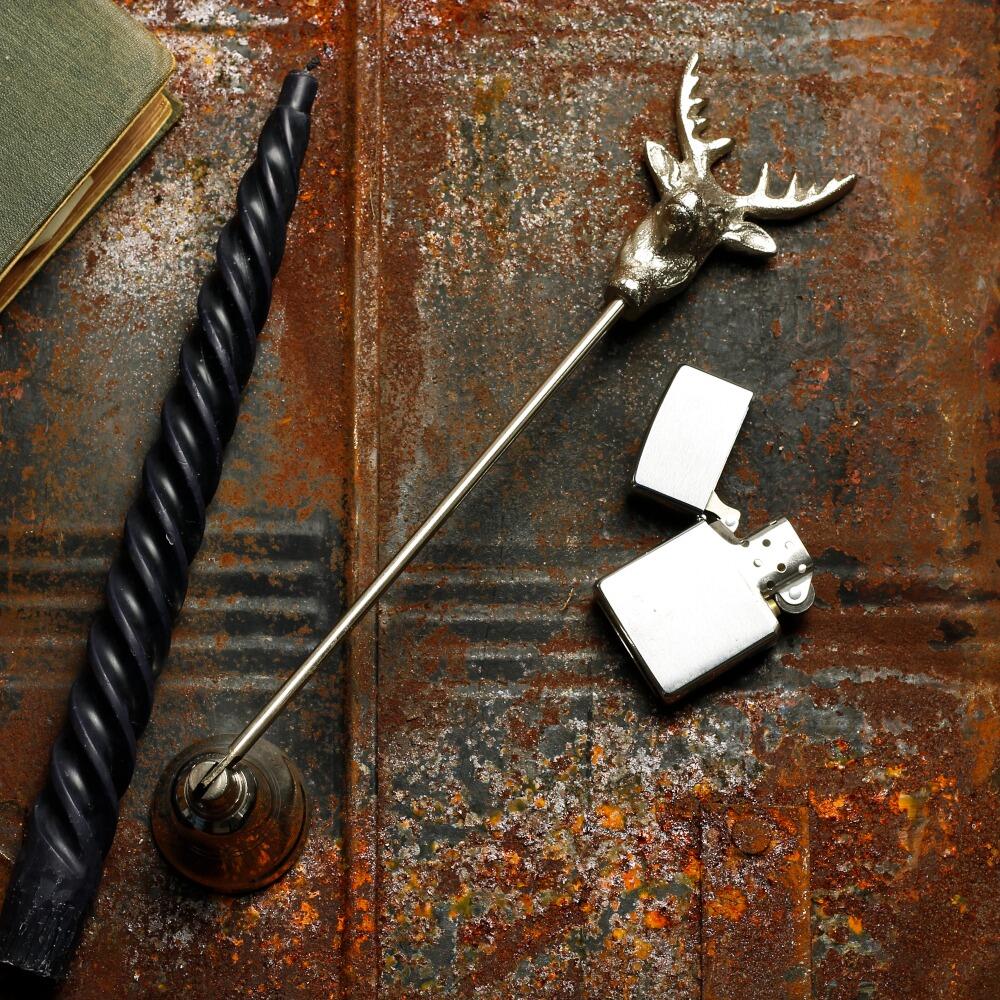Silver long handled candle snuffer with rustic stags head