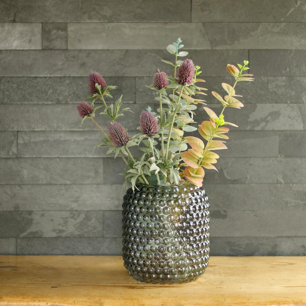 Grey bubbly glass flower vase with faux flowers