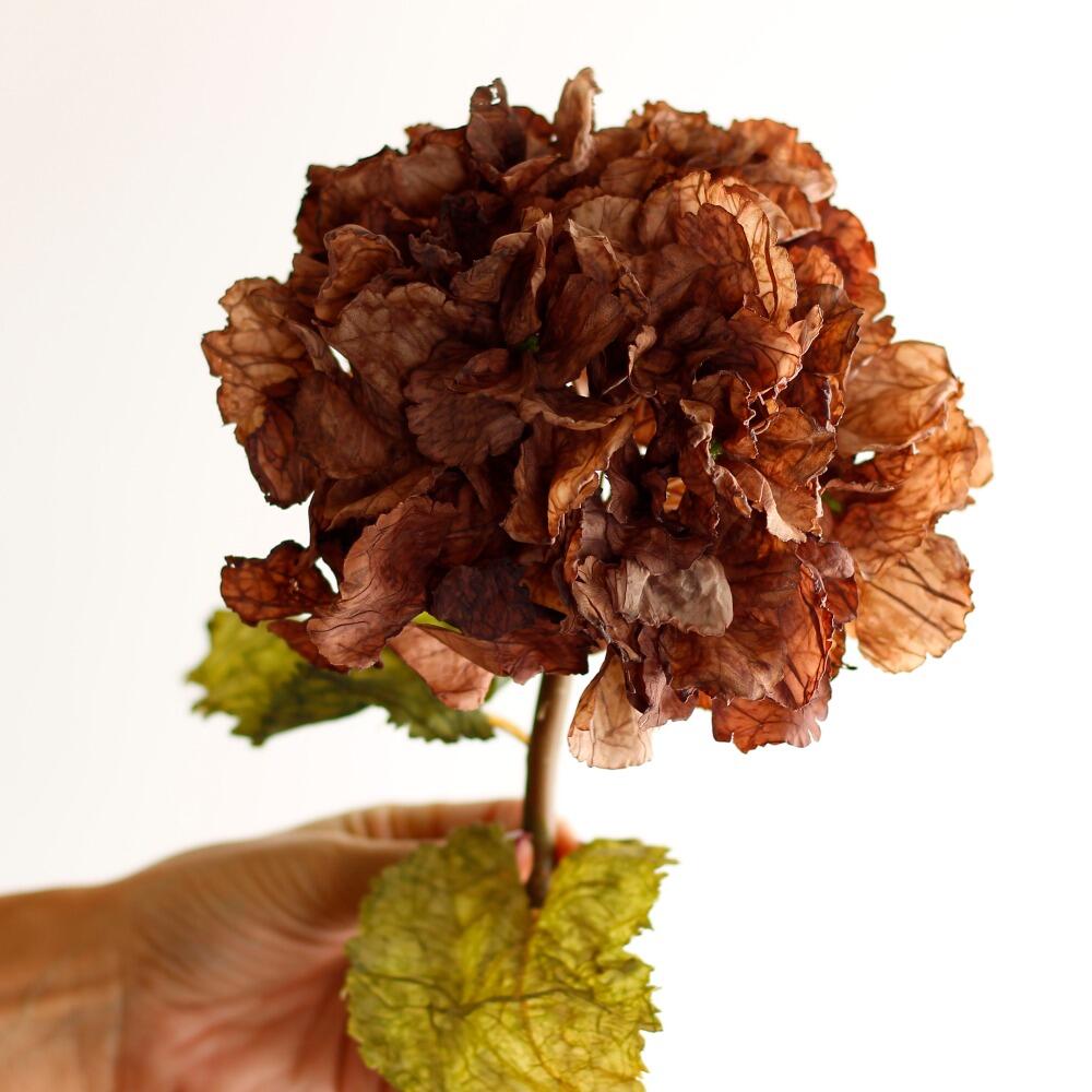 Luxury artificial hydrangea with delicate ruffled petals in a rich mocha hue