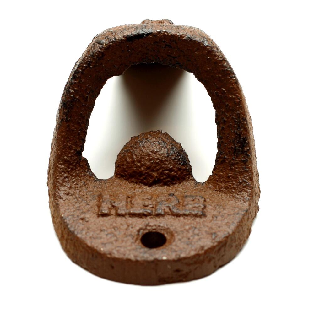 Rusty cast iron bottle top opener