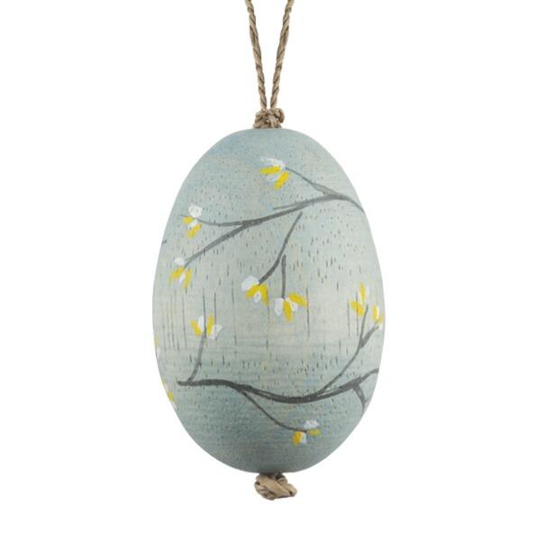 Hand-painted decorative hanging wooden egg on a string in a delightful grey blue hue adorned with delicate blossoms with white background