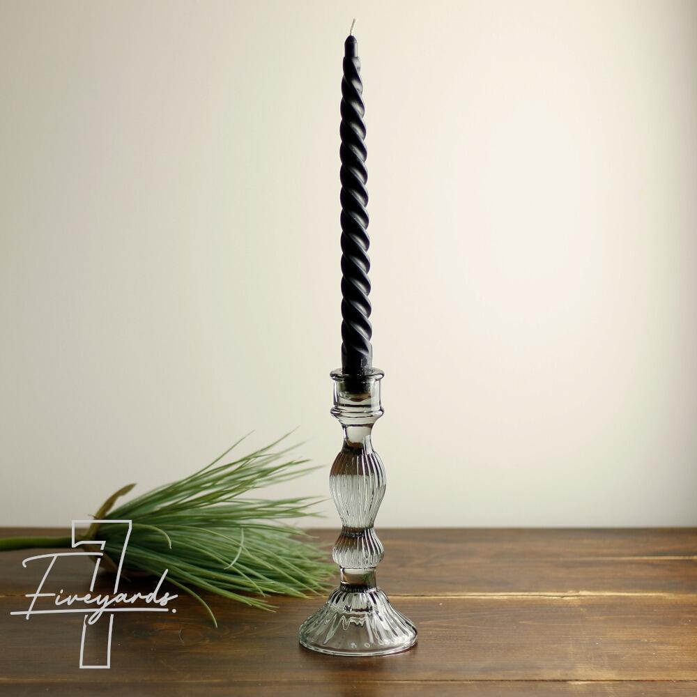 Grey glass candle stick holder with black candlestick