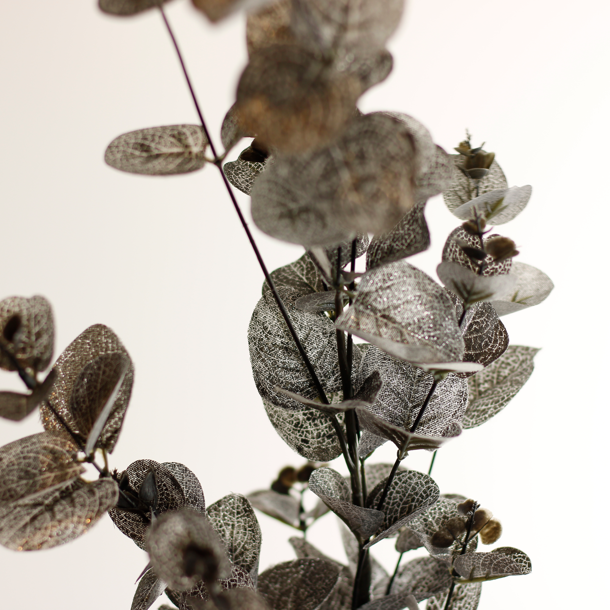 Reusable artificial eucalyptus stem for festive centrepieces and seasonal crafts