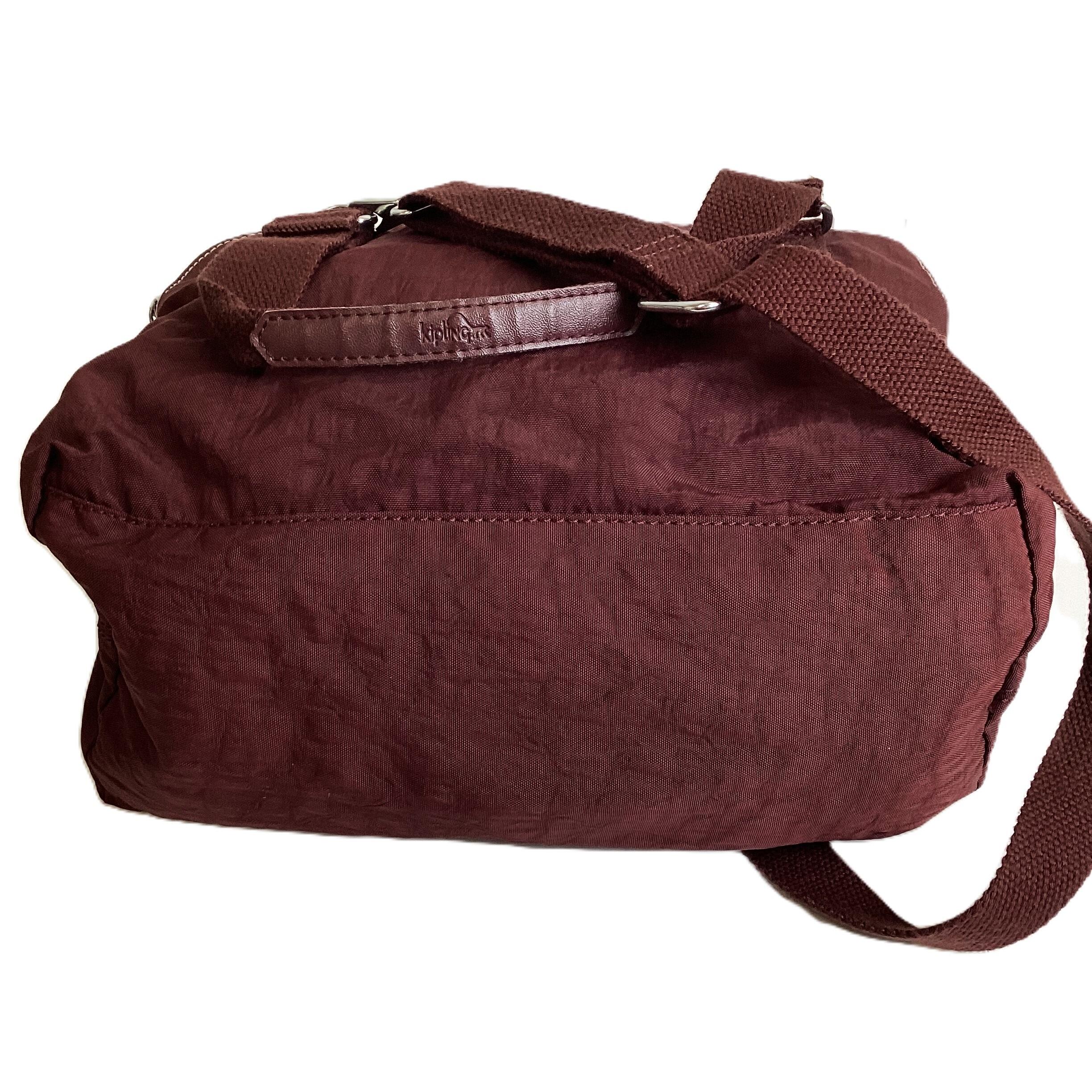 Kipling Burgundy Follo Bag With Penny The Monkey