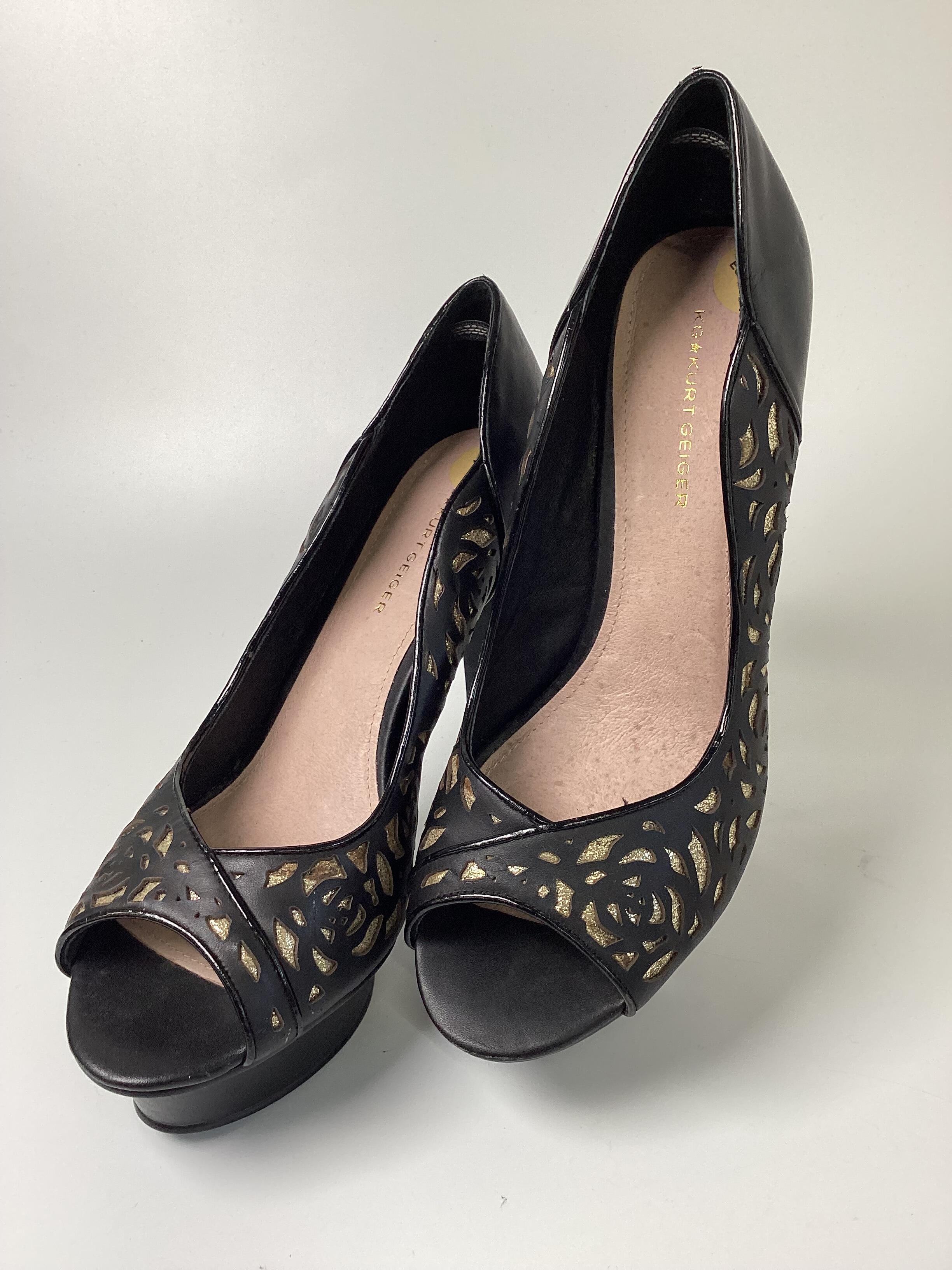 Black and hotsell gold heels uk