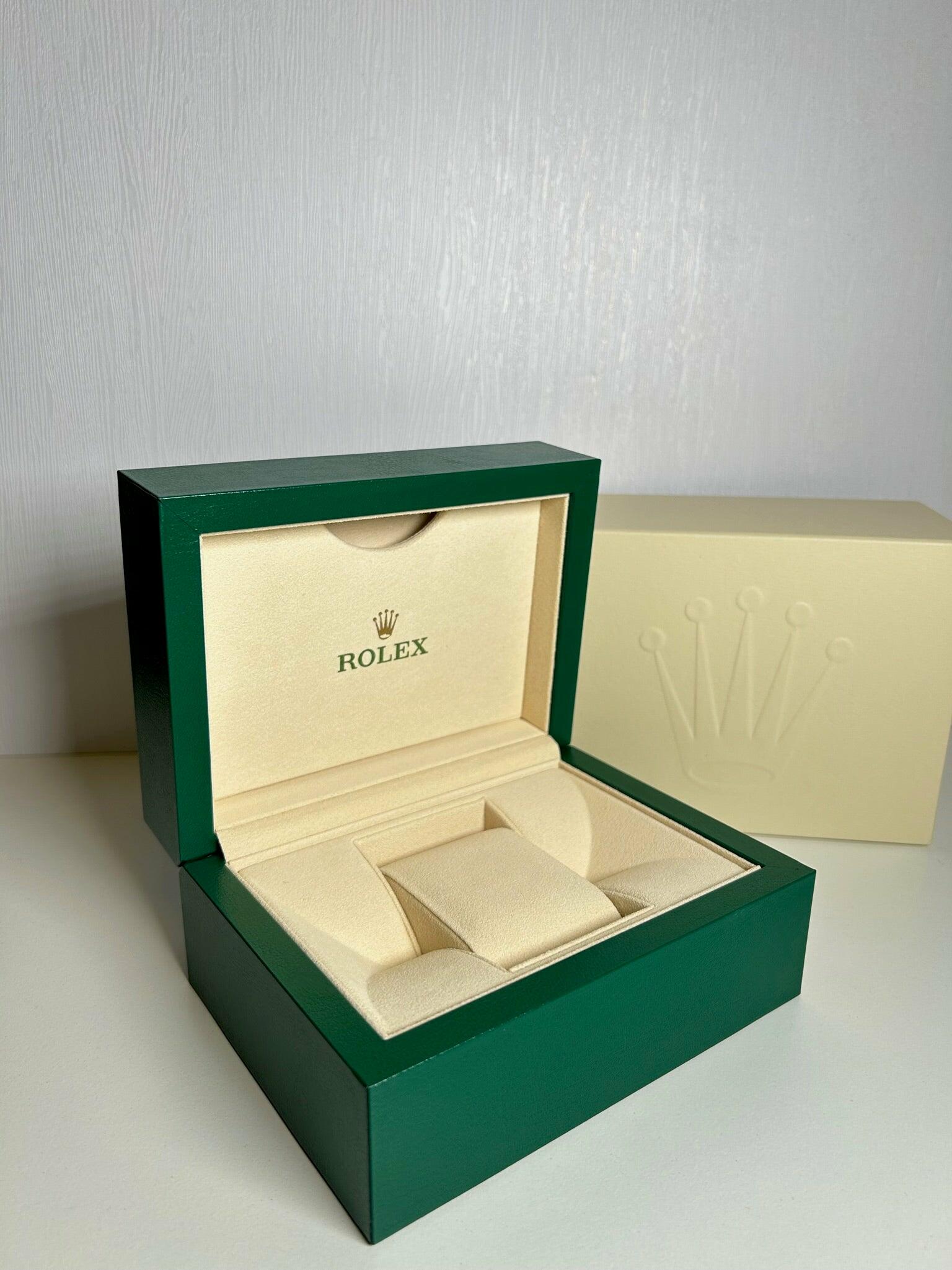 Rolex watch 2025 box and papers