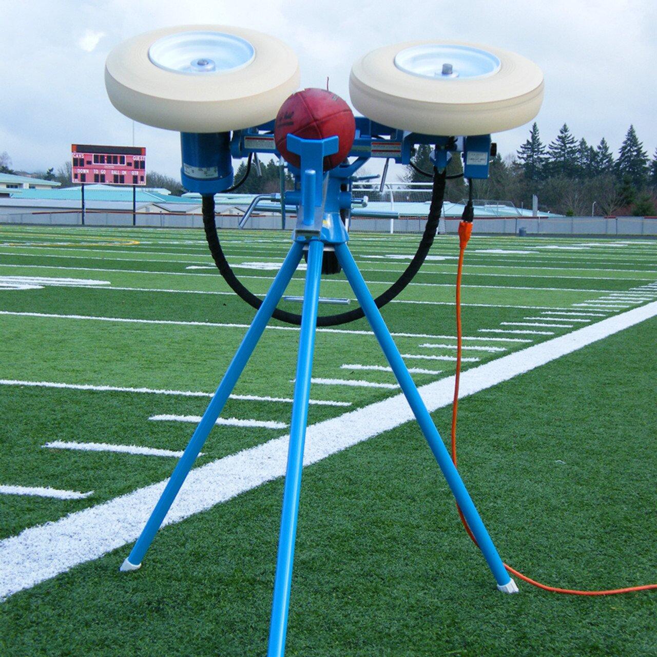 Jugs Rugby ball throwing machine on field