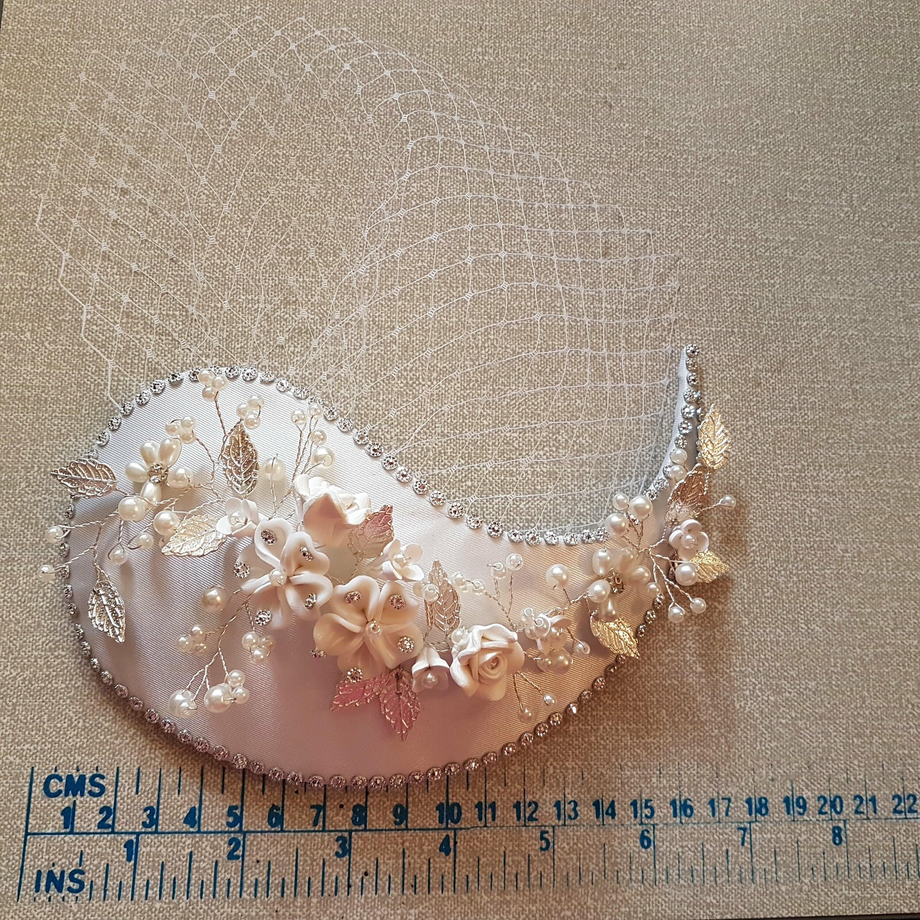wedding hatinator with mini birdcage veil
