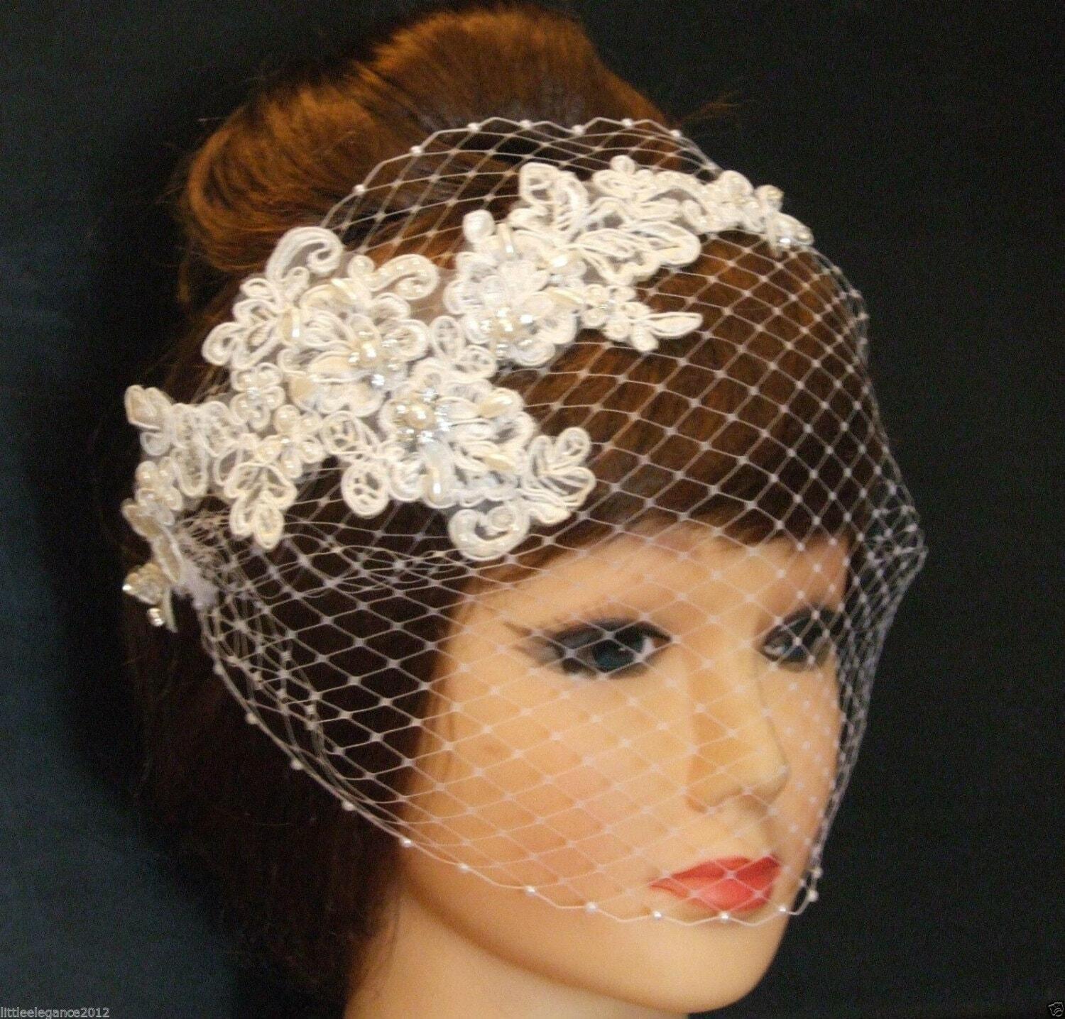 WHITE BIRDCAGE VEIL FASCINATOR
