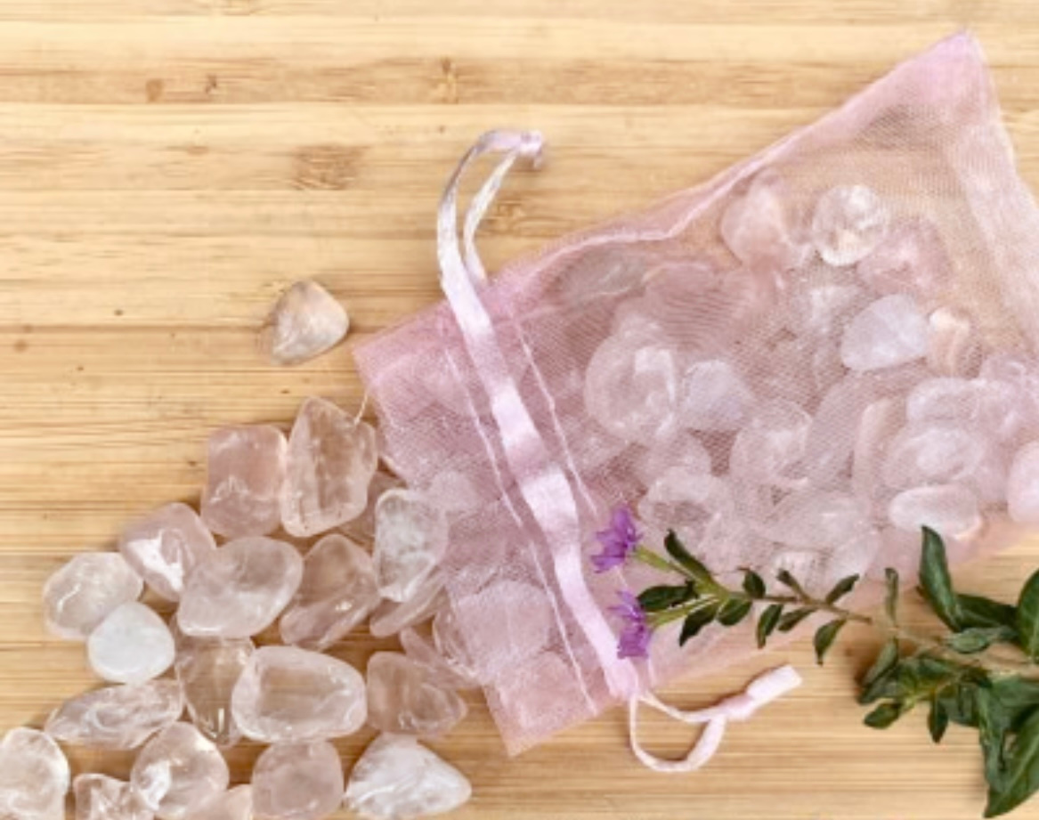 pink amethyst healing crystal chips in small pouch bag