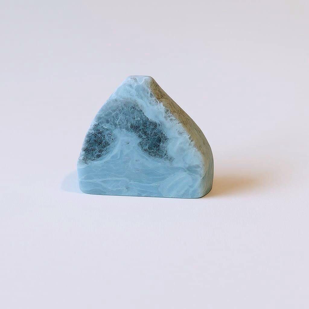 Larimar Crystal Standing on a white table
