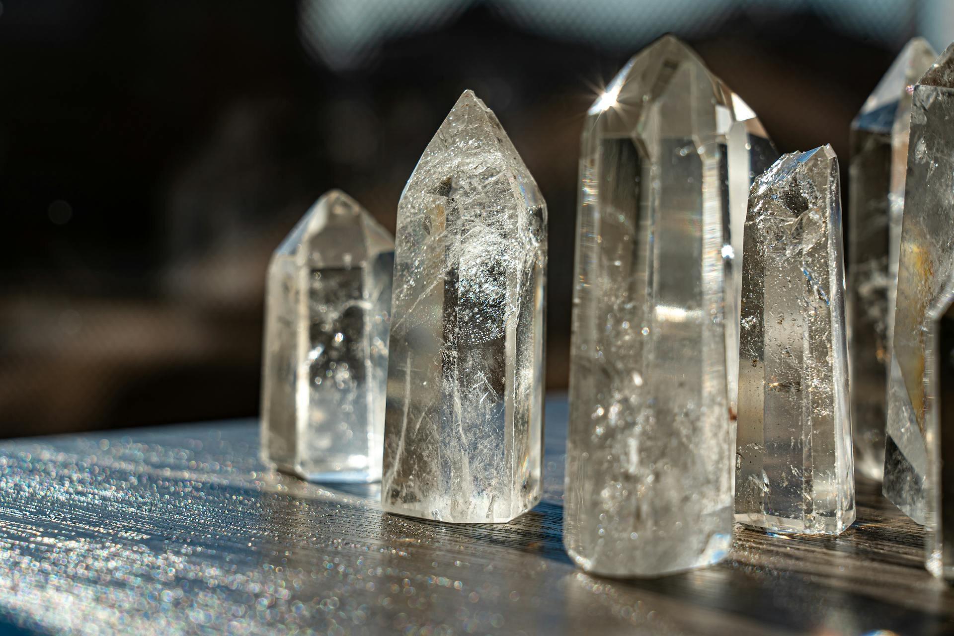 Three crystals standing on a table