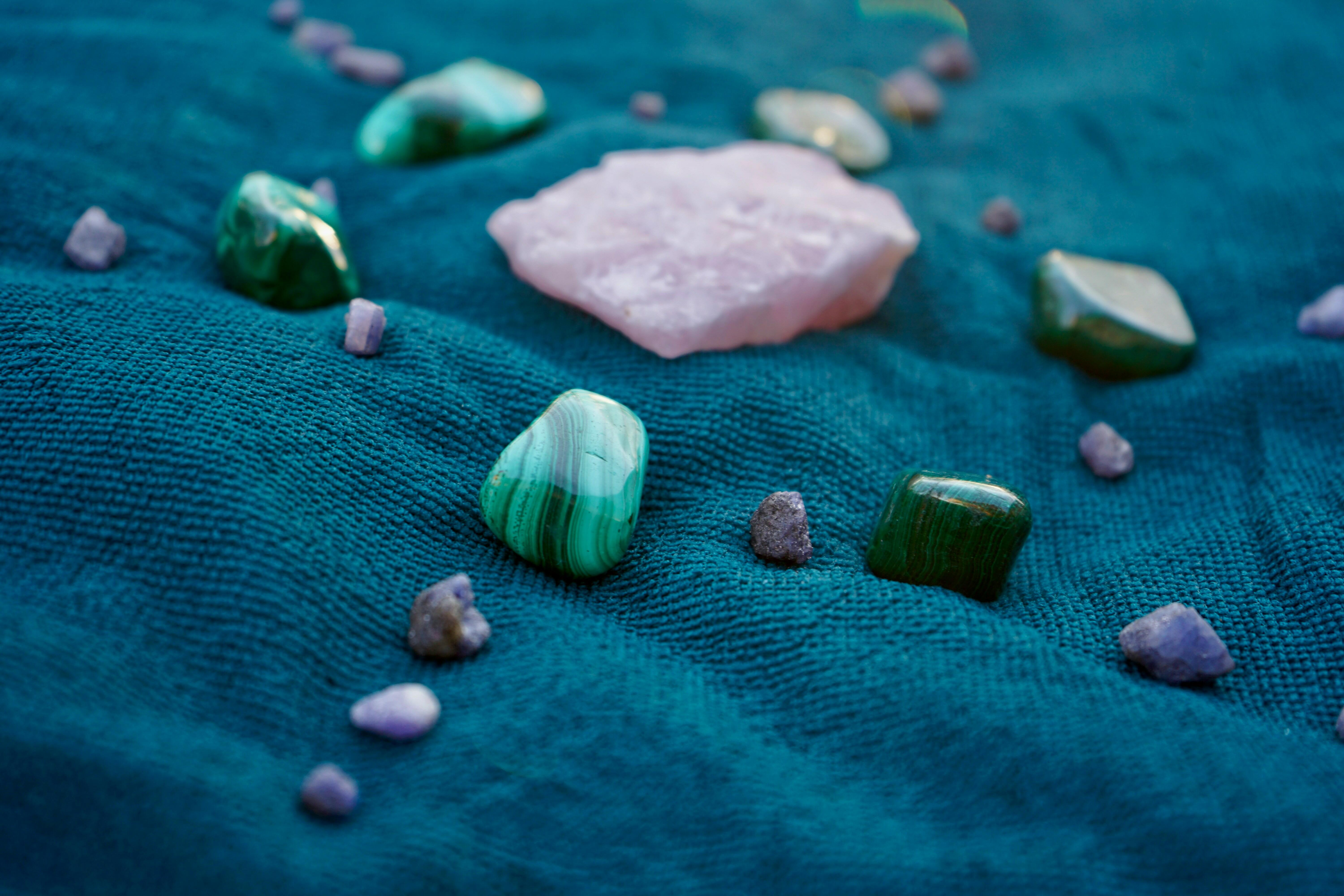 Three crystals standing on a table