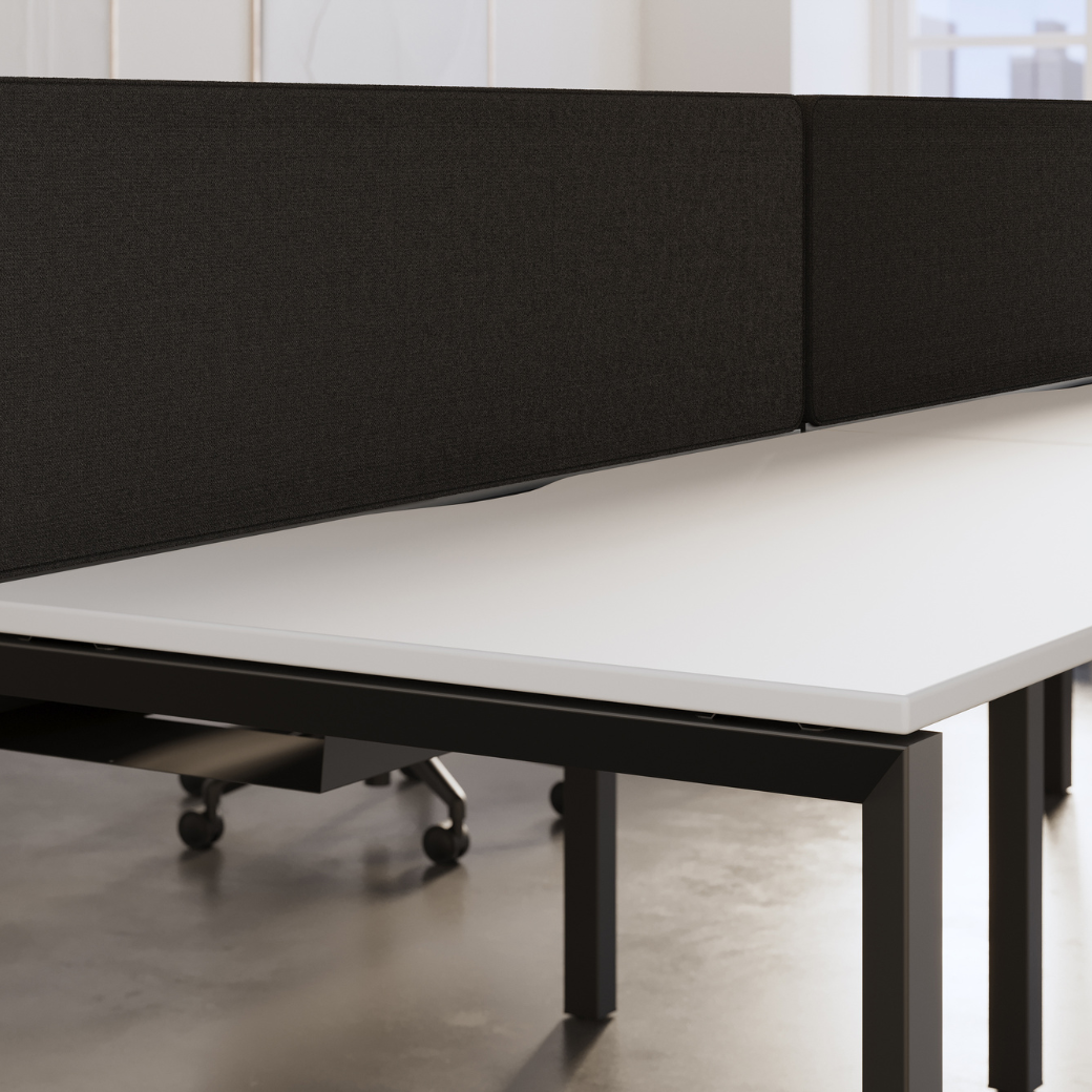 Firmo multi-user bench desks in a contemporary office environment