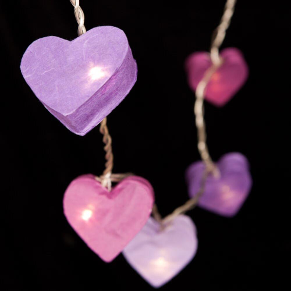 Handcrafted Radiant Heart 10 LED Fairy Lights in purple tones. Hand-screened mulberry paper hearts with warm white LEDs. Mains powered. UK plug included.