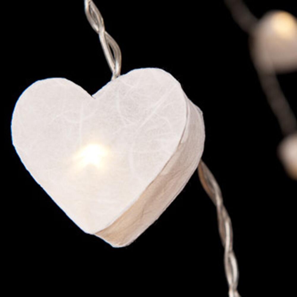 Handcrafted Radiant Heart 10 LED Fairy Lights in crisp white. Hand-screened mulberry paper hearts with warm white LEDs. Mains powered. UK plug included.