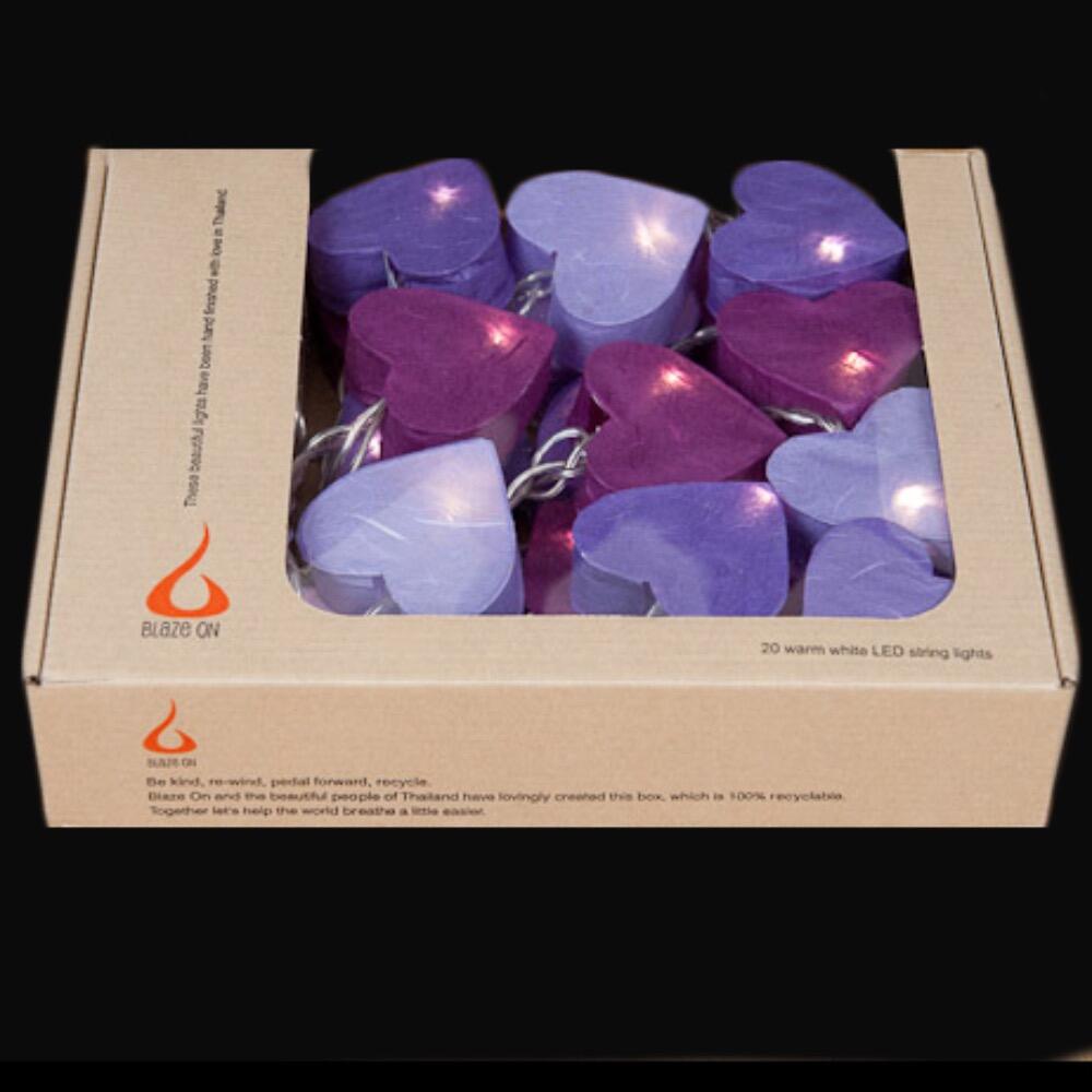 Handcrafted Radiant Heart 20 LED Fairy Lights in purple tones. Hand-screened mulberry paper hearts with warm white LEDs. Mains powered. UK plug included.