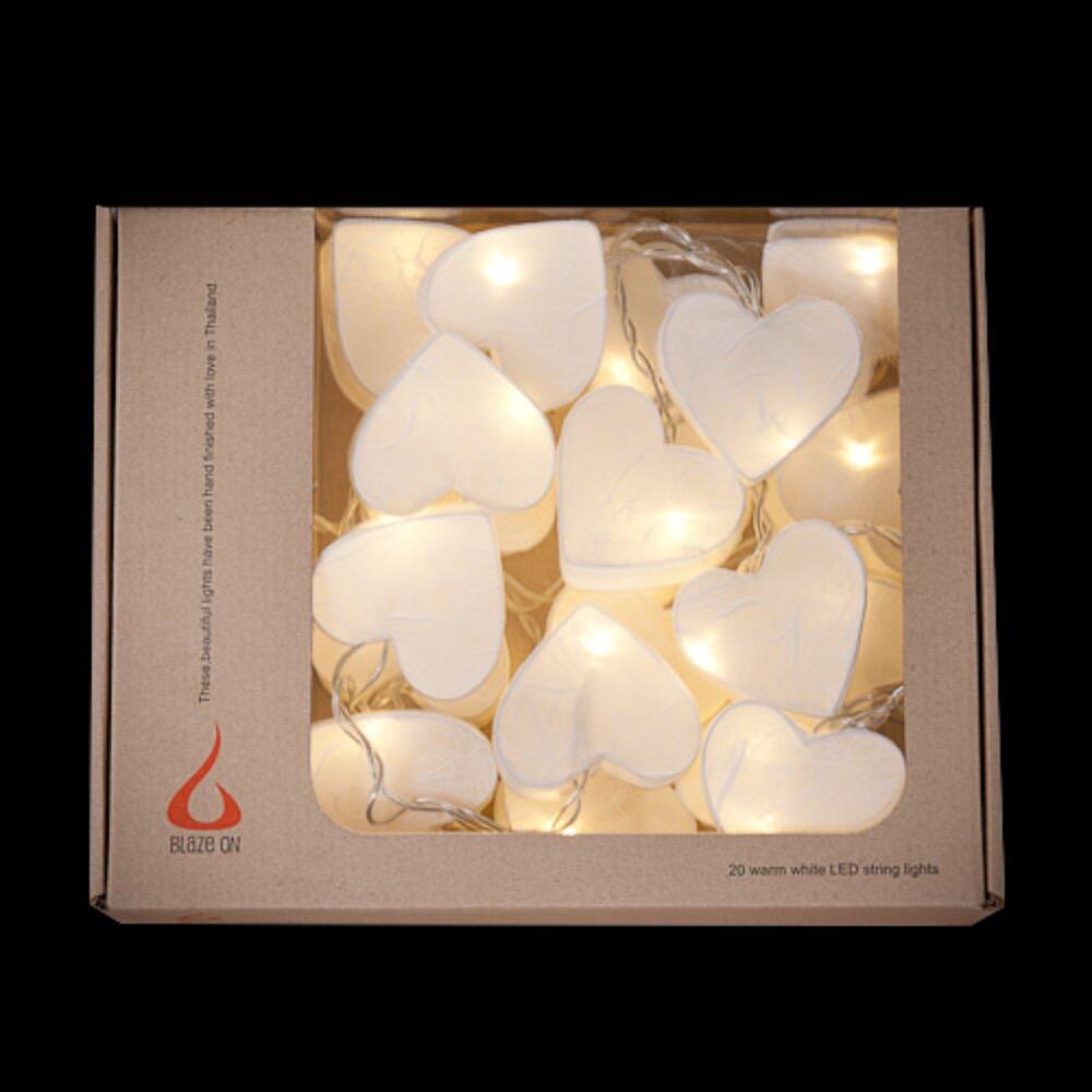 Handcrafted Radiant Heart 20 LED Fairy Lights in crisp white. Hand-screened mulberry paper hearts with warm white LEDs. Mains powered. UK plug included.