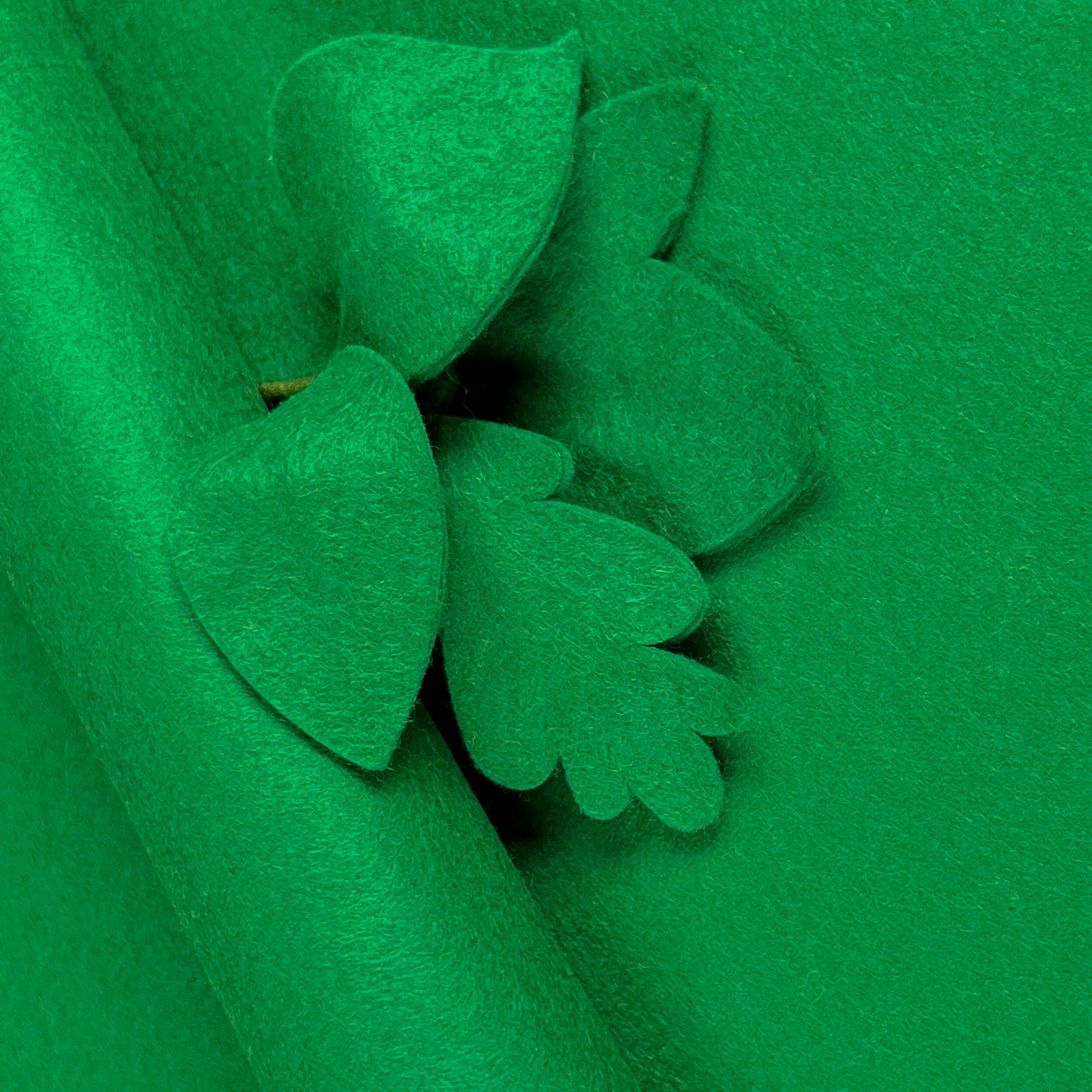Vibrant Jade Green wool-blend felt sheet shown with decorative leaf cut-outs to demonstrate its smooth matte texture and non-fray edges.