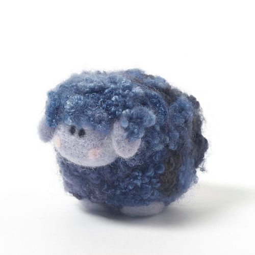 Blueberry the Ice Cream Woollie needle felting kit box and a finished fluffy blue sheep with curly hand-dyed Blue Faced Leicester fleece.