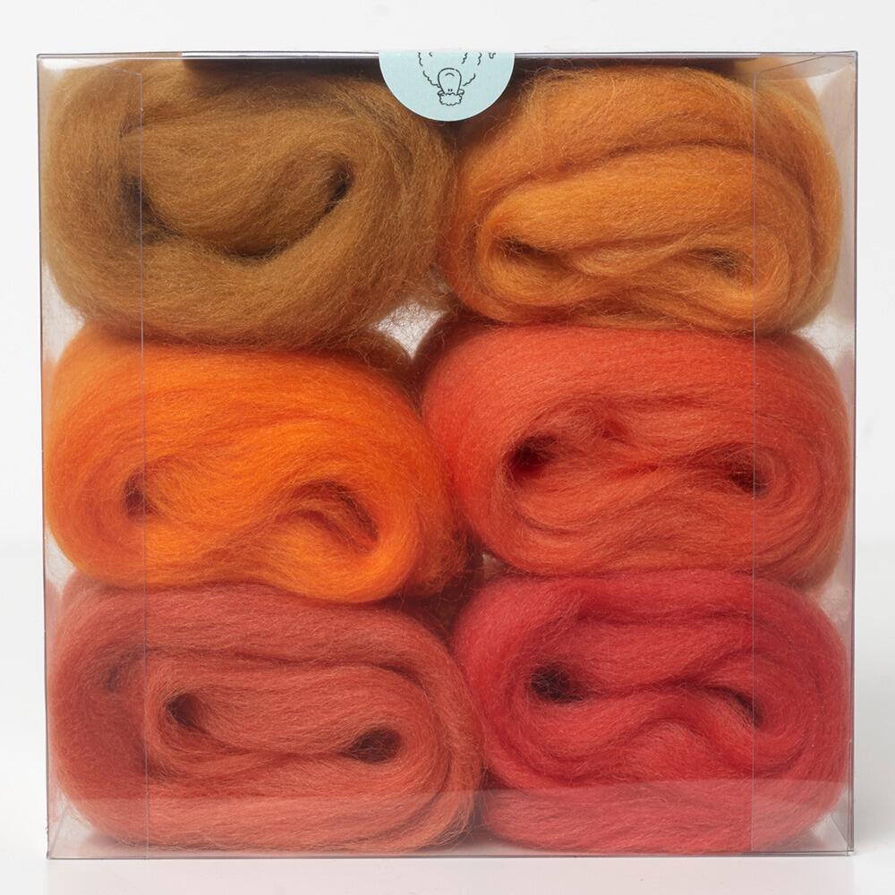 A curated oranges merino wool shade pack containing six 5g portions of non-mulesed wool tops.