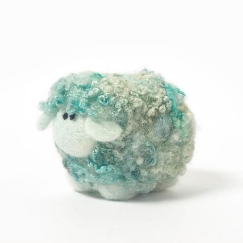 Cute needle-felted sheep figurine, Mint the Ice Cream Woollie, with a fluffy, hand-dyed turquoise and mint green Blue Faced Leicester curly fleece, and white face.