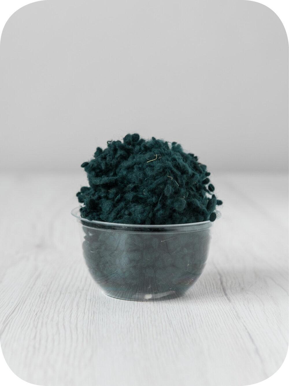 green wool nepps in a 5g portion for adding texture to felting and spinning projects
