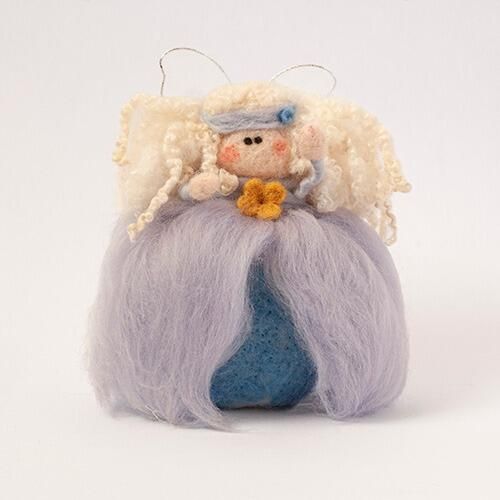A 3D needle-felted fairy in a soft blue gown named Molly with long curly white hair and a yellow flower accent.