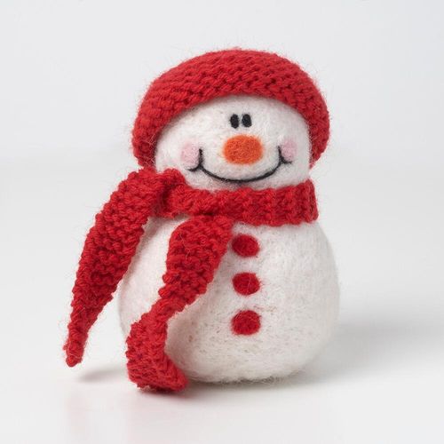 A 3D needle-felted snowman with a carrot nose, coal buttons, and a hand-knitted red hat and scarf.